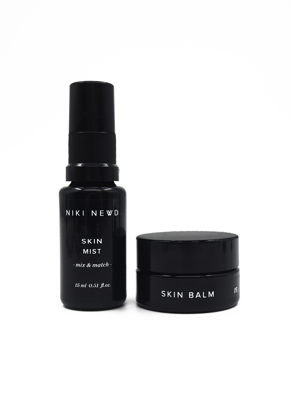 Niki Newd® Skin Balm & Skin Mist — blemish and age defense duo for daily natural skincare.