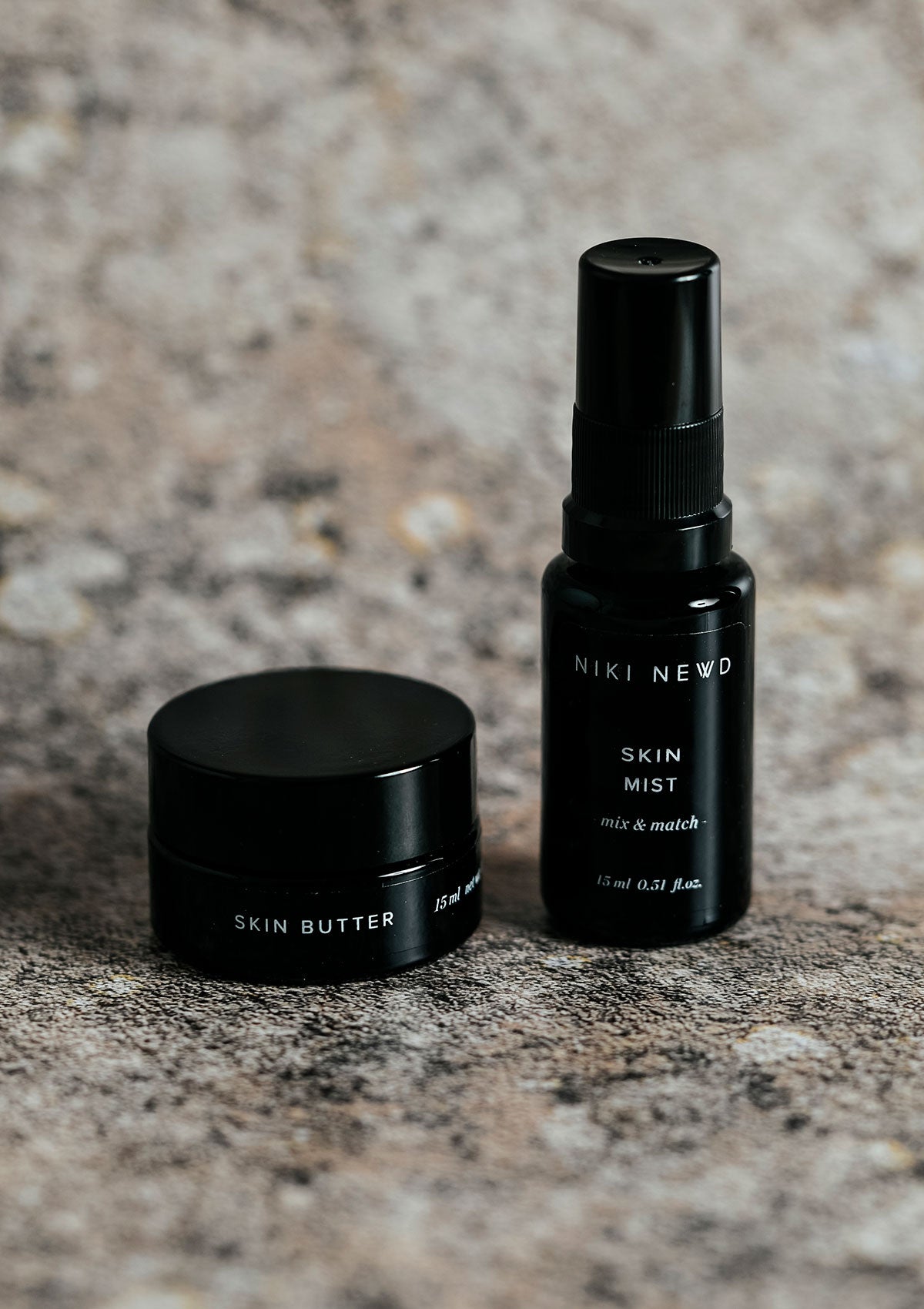 Niki Newd® Skin Butter & Mist — rich cream and vitamin-infused mist for dull skin and hydration boost.