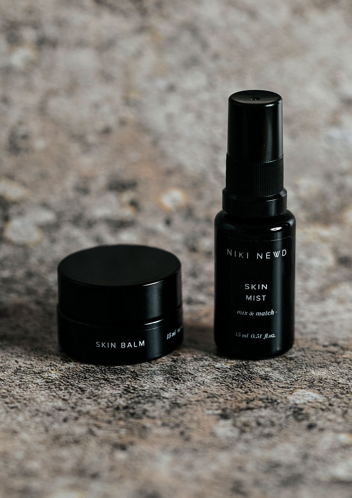 Niki Newd® Skin Balm — nourishing blemish and age defense balm paired with hydrating facial mist.