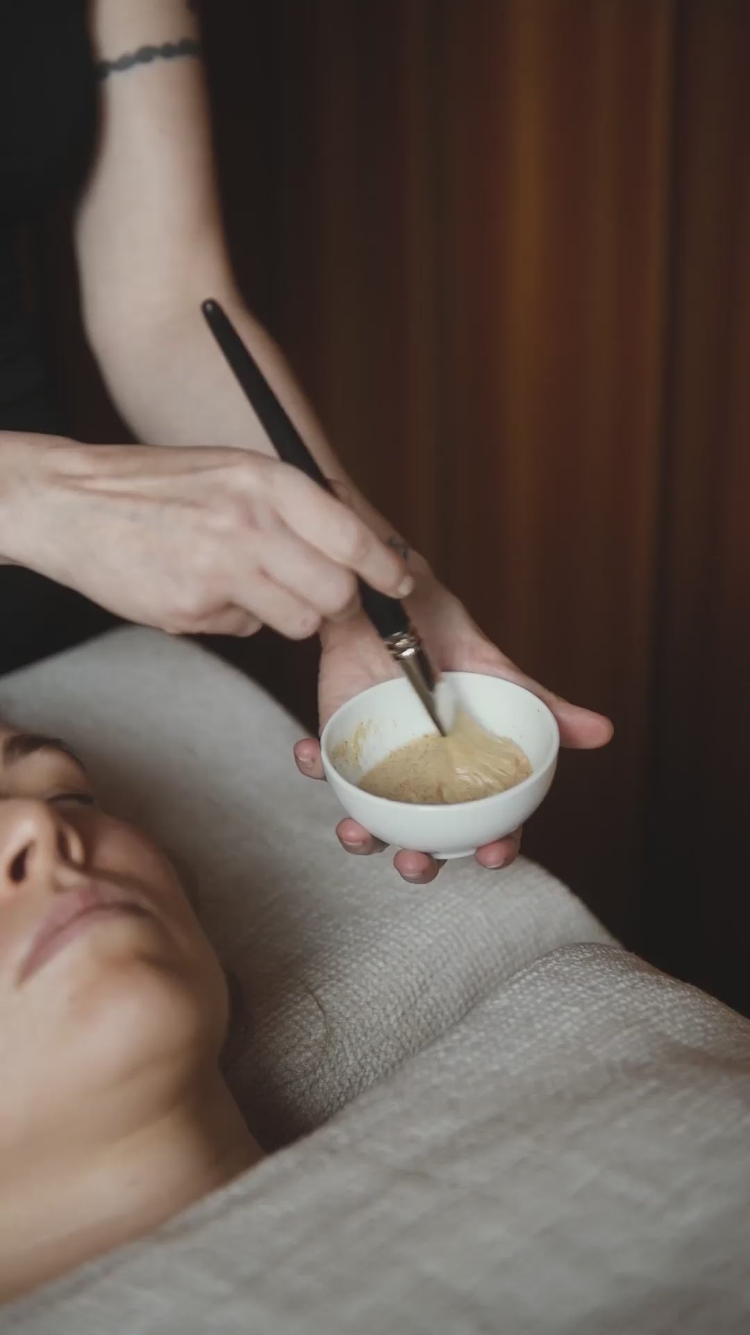Mixing a fresh Niki Newd face mask right before application. Video showing how the powder-to-paste skincare mask is freshly activated for maximum potency.